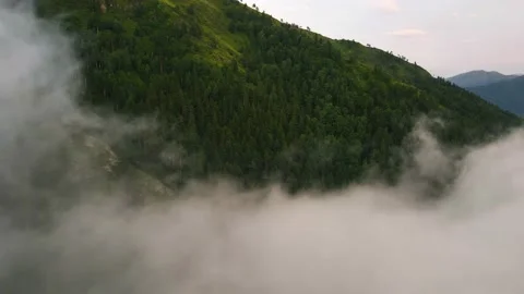 A Flight Through Mountain Clouds. Aerial 4K. Stock Footage 165856151