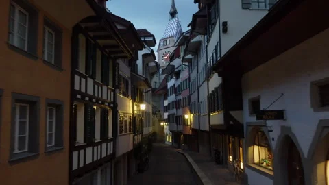 Flight through the old town of Zug towards the Zytturm (Switzerland) Stock Footage 332429924