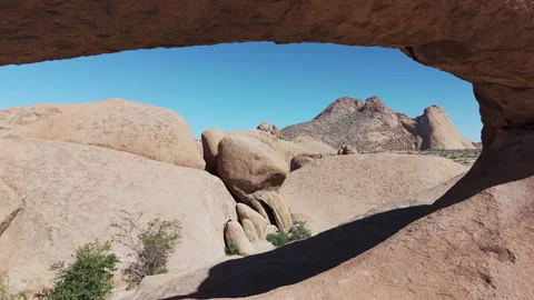 Flight through rock arch in erongo moiuntains, Namibia Stock Footage 335233964