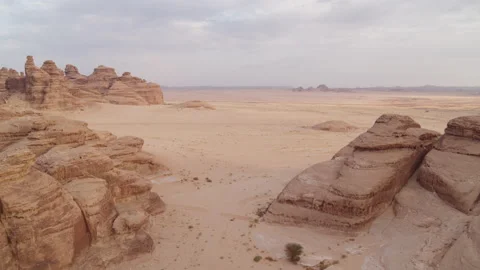 Flight through rock canyons in Saudi Arabia desert. 4K Aerial Stock Footage 196832812