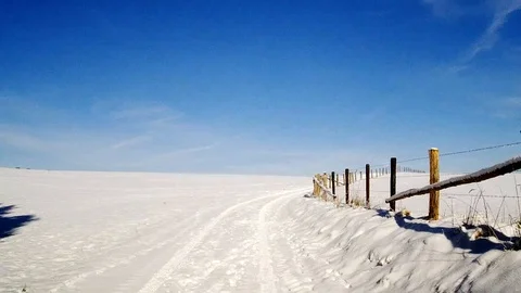Flight through a snowy landscape in the sun Stock Footage 85637715