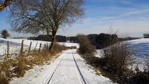 Flight through a snowy landscape in the sun Stock Footage 85637749
