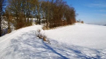 Flight through a snowy landscape in the sun Stock Footage 85637755