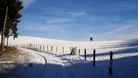 Flight through a snowy landscape in the sun Stock Footage 85637851