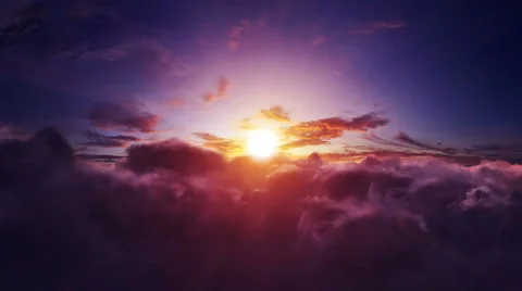 Flight through the sunset clouds. Easy to loop.  Stock Footage