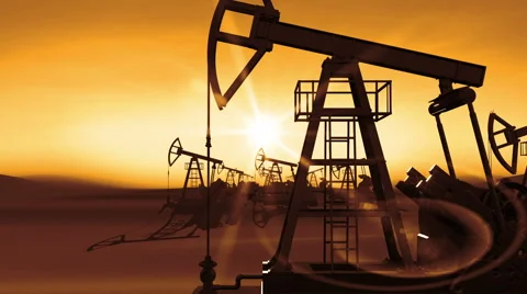 Flight Through the working Oil Pump Jacks to the Sun Shining Orange Light. Stock Footage 61294084