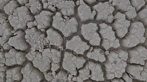 Flight to top over Cracked ground of lake dried because of Ecological Disaster Stock Footage 112384832