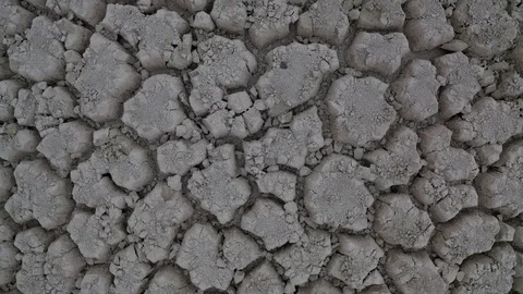 Flight to the top over Cracked ground of lake dried Ecological Disaster Stock Footage 112459952