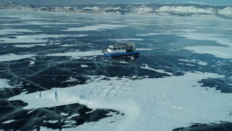 Flight Tourist ship hovercraft fast rides frozen winter ice lake Baikal Siberia Stock Footage 165215853