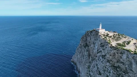Flight towards lighthouse, Cap Formentor, Mallorca Stock Footage 242706718