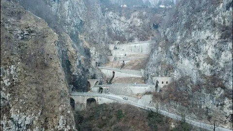 Flight towards San Boldo pass serpentine road in Italy Stock Footage 113825995