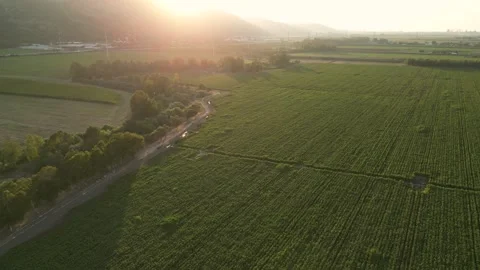 A flight towards the sunset over a beautiful rural landscape 库存影片 289784787