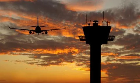 Flight tower and plane Stock Photos