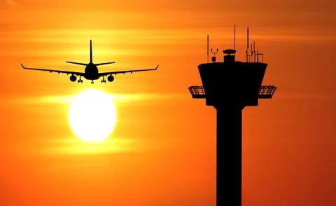 Flight tower and plane Stock Photos