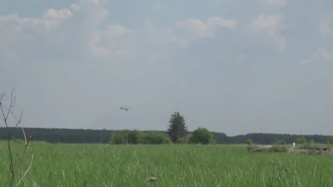 Flight of two motor planes over the airfield Stockbeeldmateriaal 75361960
