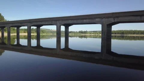 Flight under Bridge Lake Blessington Ireland Stock Footage 92125657