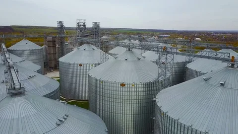 Flight under granaries and elevators in spring Stock Footage