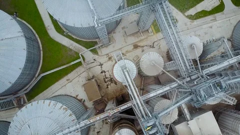 Flight under granaries and elevators in spring Stock Footage 75155586