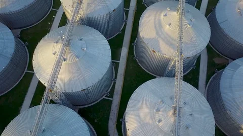 Flight under granaries and elevators in spring Stock Footage 75767091