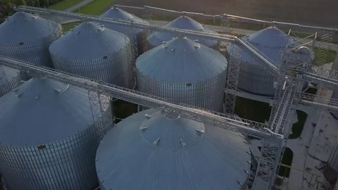 Flight under granaries and elevators in spring Stock Footage 75937029