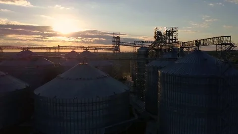 Flight under granaries and elevators in spring Stock Footage 75937083