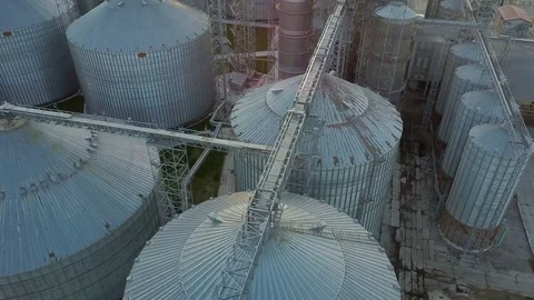 Flight under granaries and elevators in spring Stock Footage 75937089