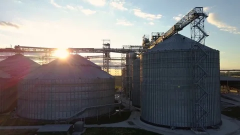 Flight under granaries and elevators in spring Stock Footage 75937109