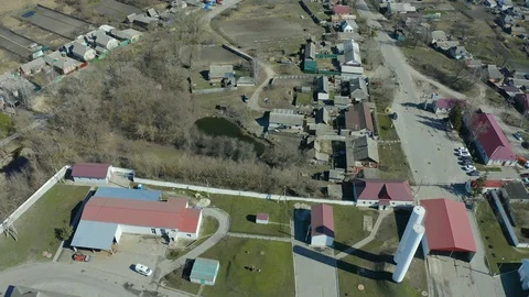 Flight under granaries and elevators in summer - aerial survey. Stock Footage 127655501