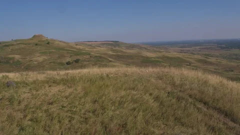 Flight under hills 動画素材 94724862