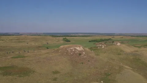 Flight under hills Video stock 94724876