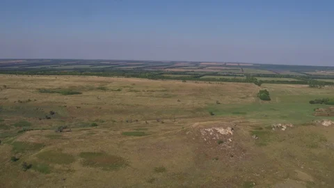 Flight under hills Stock-Footage 94724895