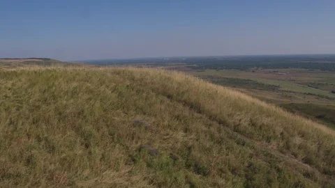 Flight under hills 스톡 동영상 94724907