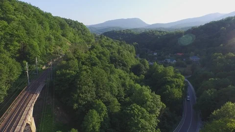 Flight under mountain road Vídeo Stock 94723932