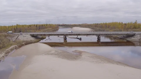 Flight under river and bridge Stock-Footage 94723877