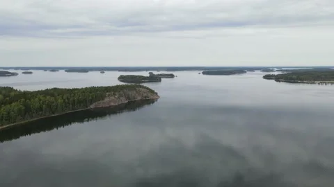 Flight under rocks and pine forest at a spring day. Stock Footage 154301117