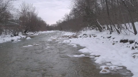 Flight under winter river and forest Video stock 94724667