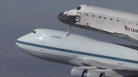 In-flight view Space Shuttle Atlantis STS-125 ferry flight atop NASA Boeing 737 Stock Footage 283627305