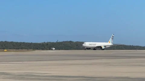 Flight from the Vuelta a la Patria program arrives in Venezuela with migrants fr Stock Footage 326939113