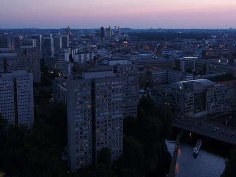 A flight while sun goes down above central Berlin, aerial, blue hour. Stock Footage 79885284