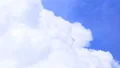 Flight in white cumulus clouds on sunny day, travel into wonderland, dreams HD Footage