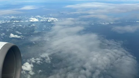 Flight window view over Philippines Pacific Ocean Cebu island Southeast Asia Stock Footage 341852059