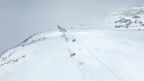 Flights on the FPV drone are close with a new chairlift Stock Footage 187694445
