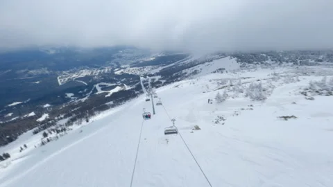 Flights on the FPV drone are close with a new chairlift Stock Footage 187705412