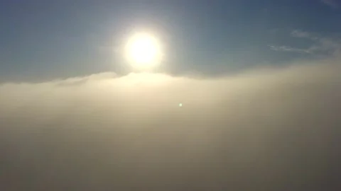 Fligth to the sunrise above the clouds Stock Footage 142278386