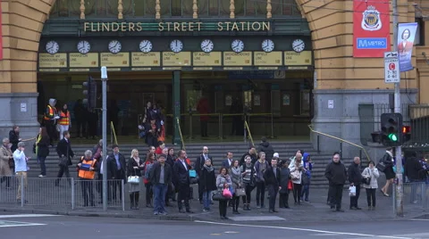 Flinders St Station corner Melbourne Pedestrians HD Stock Footage 54311483
