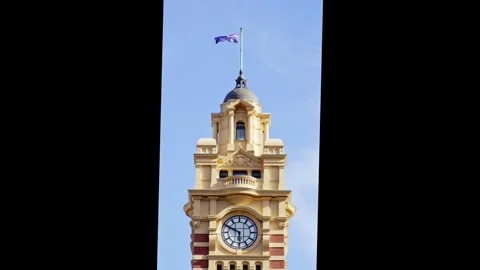 Flinders Street Station Clock Tower Under Blue Sky Stock Footage 324693194