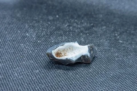 Flint on black background Stock Photos