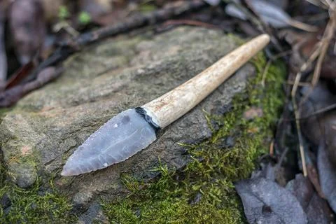 Flint knife - stone age tool in nature Stock Photos