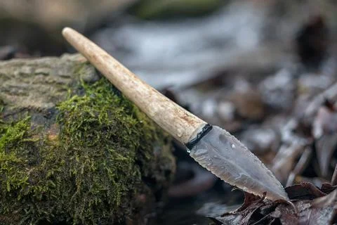 Flint knife - stone age tool in nature Stock Photos
