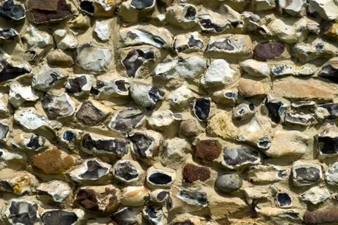 Flint wall full frame background texture Stock Photos